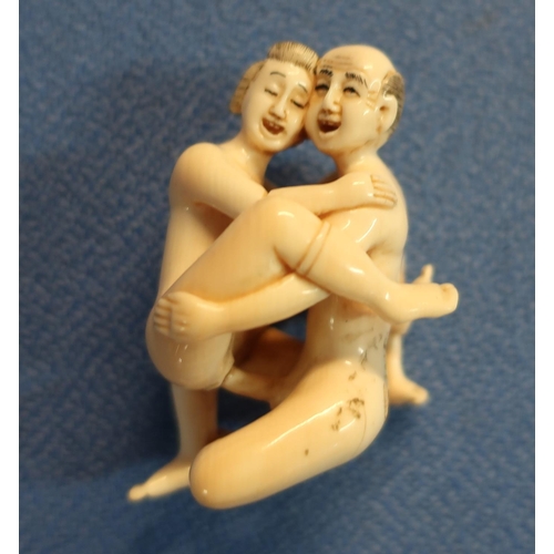 45 - Early 20th C carved ivory erotic Netsuke with signature panel to the buttock (height 4.5cm)