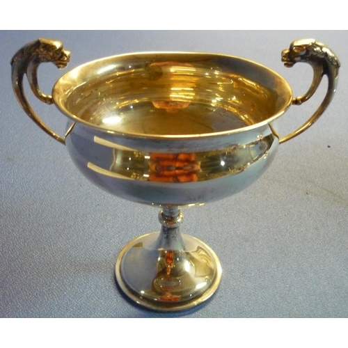 54 - London 1912 silver hallmarked twin handled lion mask trophy cup with engraved detail 