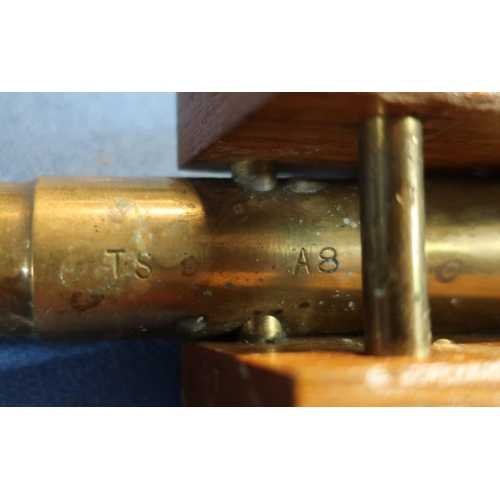 64 - Brass model of a cannon with 15cm staged barrel on oak carriage