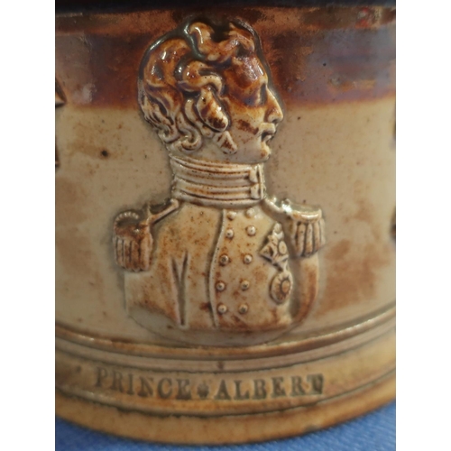 66 - Victorian stoneware tobacco jar commemorating Queen Victoria and Prince Albert, the lift off lid cre... 