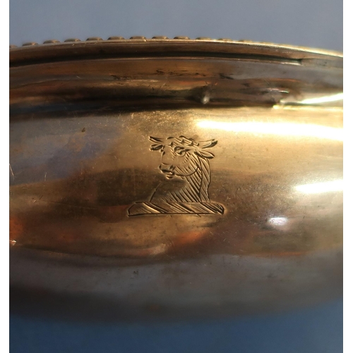 13 - George III silver pap boat (marks worn) with engraved bulls head crest and beaded detail to the top ... 