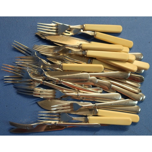 32 - Six pairs of plated fish knives and forks and twelve pairs of dessert knife and forks