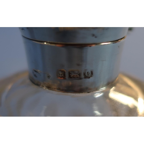 35 - Birmingham 1913 silver hallmarked topped cut glass globe shaped scent bottle (height 9.5cm)