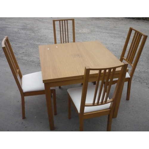 477 - Modern beech extending dining table and four chairs with upholstered seats