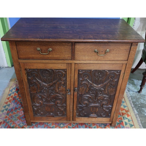 495 - Oak side cabinet with two drawers above two panelled cupboard doors (86.5cm x 51cm x 84.5cm)