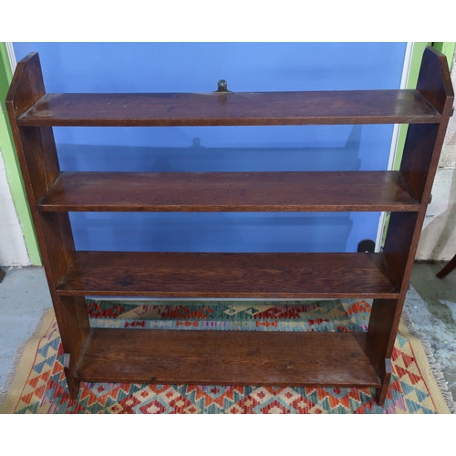 498 - 20th C oak three tier open bookcase (width 99cm)