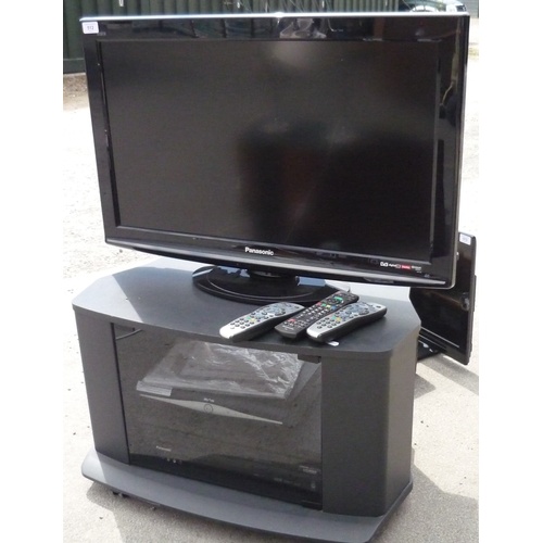 512 - Panasonic Viesa 31 inch flat screen TV, complete with stand, Panasonic DVD Player, Sky box etc