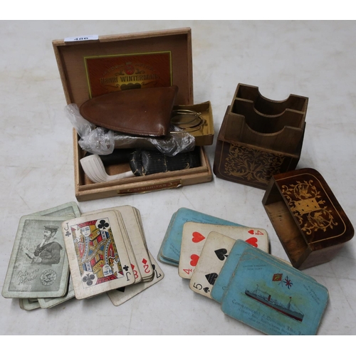 486 - Cigar box containing clay pipe, various spectacles, a leather cased folding leather travel cup, an i... 