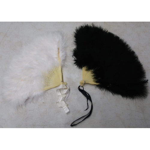 490 - Two vintage black and white ostrich feather fans