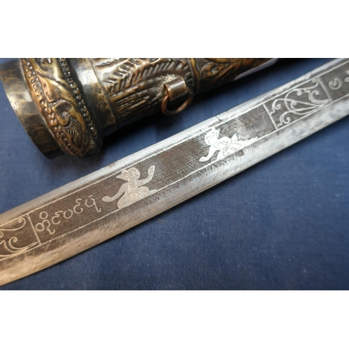 17 - Eastern style Dhal type dagger with 10 1/2 inch single edged blade with engraved detail of various f... 
