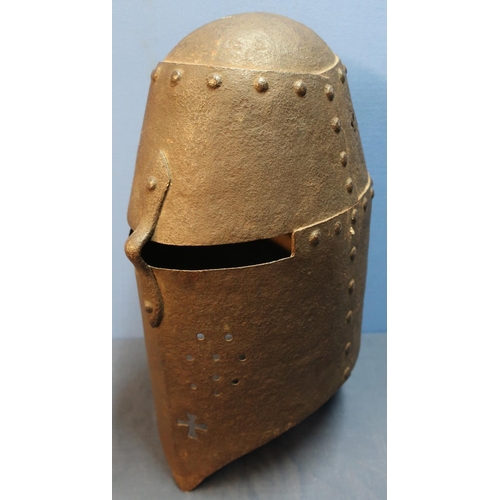 30 - English steel closed type helmet with eye slit and single nasal bar, with riveted detail to the plat... 