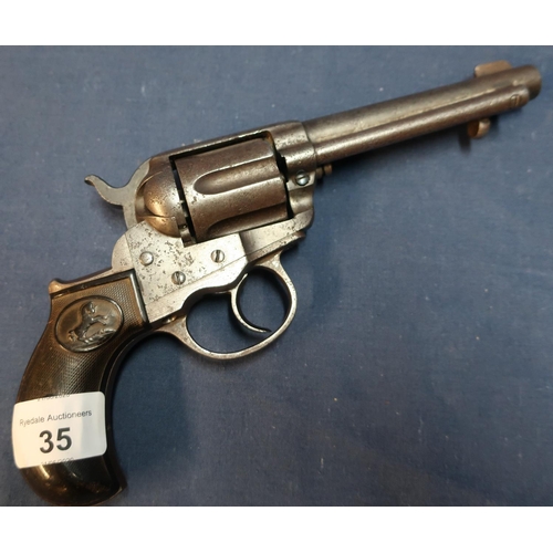 35 - Colt .41 centre fire double action revolver with 4 1/2 inch barrel with engraved details to the top ... 