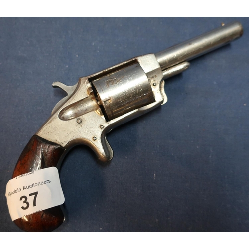 37 - Invincible No.2 .32 rimfire revolver with nickle plated finish, 2 1/2 inch barrel and two piece wood... 