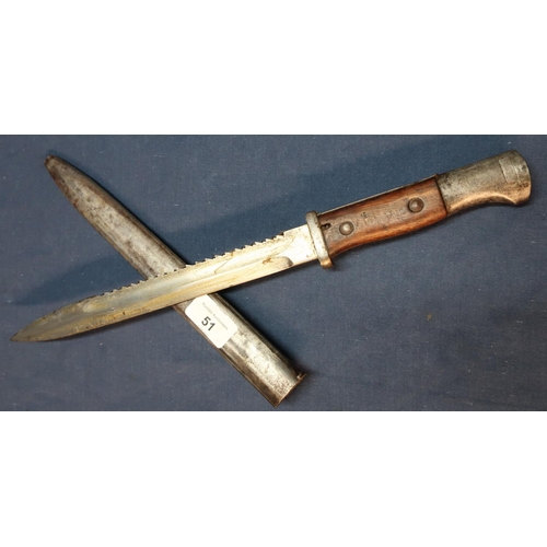 51 - German Mauser saw back bayonet with 9 3/4 inch saw back blade, two piece wooden grips and steel shea... 
