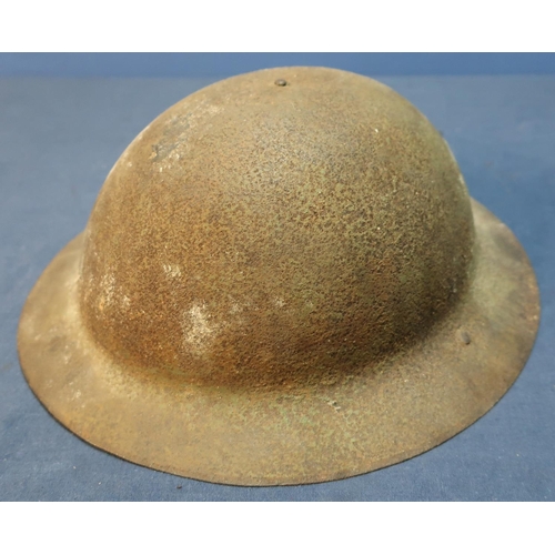 64 - WWI British Somme battlefield relic state steel helmet