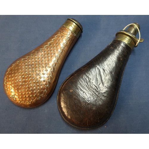 77 - Leather bodied powder flask and a Dixon copper bodied flask (lacking spout) (2)