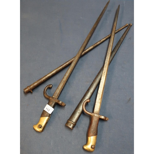 113 - Two 19th C French Gras bayonets complete with scabbards, dated 1881 (2)