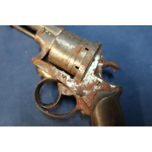 90 - Belgium pinfire revolver with 5 1/2 inch octagonal barrel and two piece wooden grips (A/F)