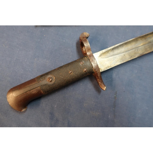 92 - British 1853 pattern bayonet with 23 inch blade (edge nicks) (damage to quillon), complete with leat... 