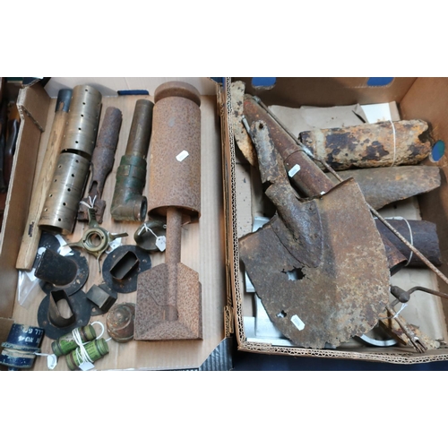 134 - Selection of relic state military items, shrapnel, spade head, bomb tail fins, axe shaft, other misc... 