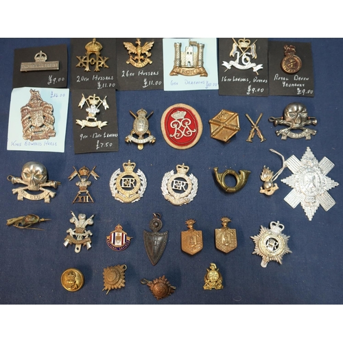 163 - Selection of various assorted military cap badges, mostly British including a good selection of Cava... 