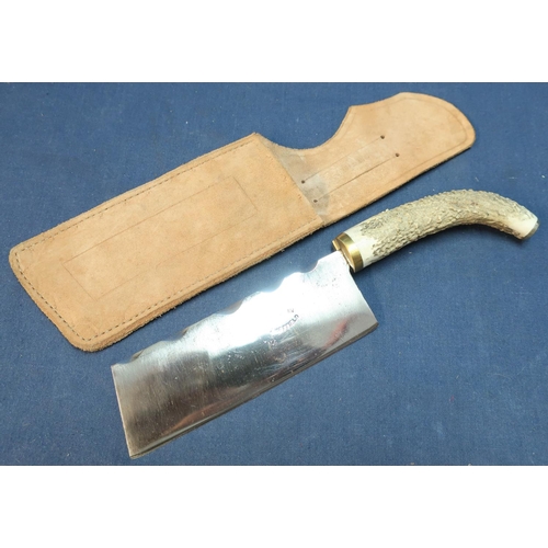 264 - Sheffield made hatchet with 6 1/2 inch blade and Sambar horn grip, complete with leather sheath