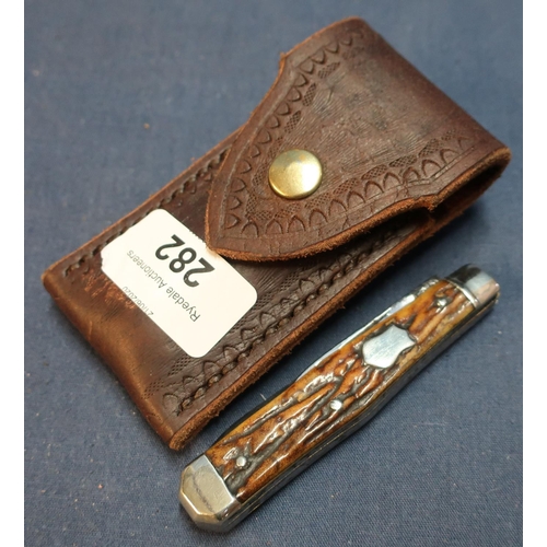 282 - George Wostenholme of Sheffield I.XL twin bladed vintage pocket knife with two piece lamb foot grips... 