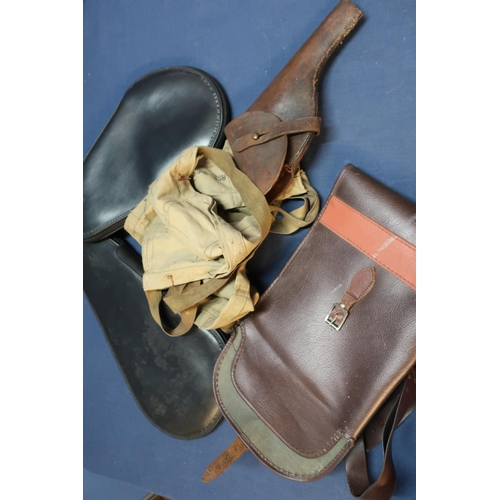 292 - Two padded pistol travelling cases, gun slip, bandoleers and a circa WWI tan leather pistol holster