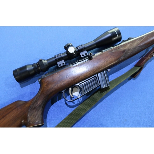 624 - Voere .22 LR semi auto rifle, fitted with sound moderator and 3-9x40 scope, complete with rifle slin... 