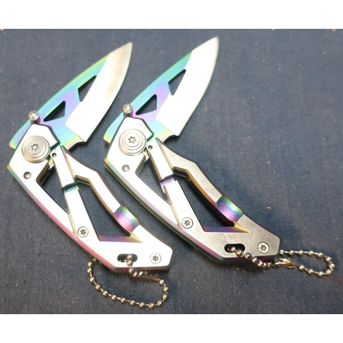 553 - Two boxed as new keyring knives