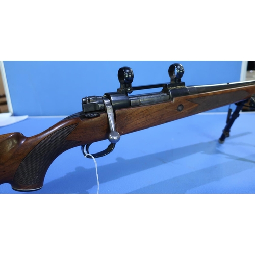 612 - .243 Midland Gun Co bolt action rifle fitted with one inch scope rings and Harris bipod, serial no. ... 