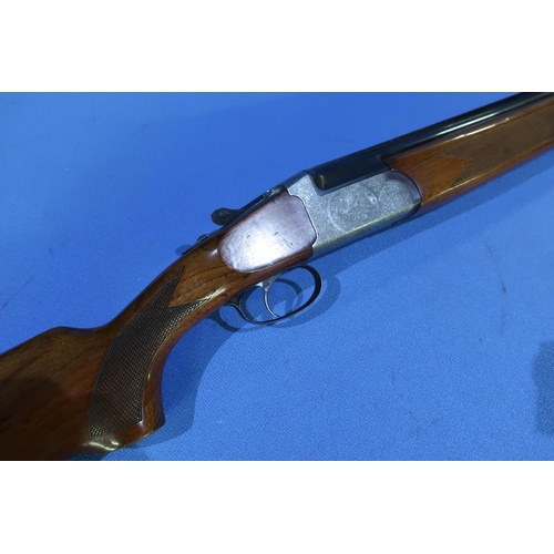 665 - Italian 12 bore over and under single trigger ejector shotgun with 27 3/4 inch barrels, 14 1/4 inch ... 