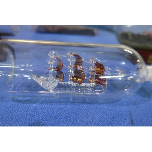 118 - Collection of four ship in bottle figures
