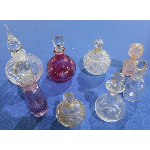 122 - Collection of eight Victorian and later cut and moulded glass scent bottles (tallest 16cm high)