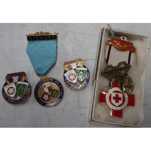 130 - Silver gilt R.A.O.B Buffalo Lodge bar brooch, an enamel Red Cross Society medal, Stewards Masonic ba... 