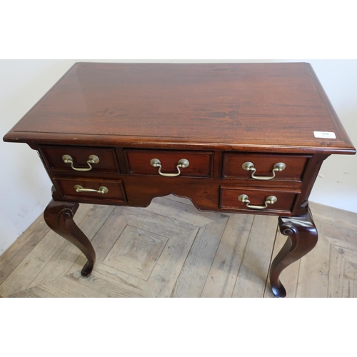 181 - Quality reproduction mahogany low boy with central drawer flanked by four further short drawers (73c... 