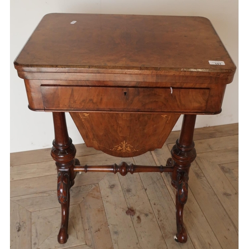101 - Victorian walnut combination games and sewing table, with revolving fold-out top with inset chess bo... 