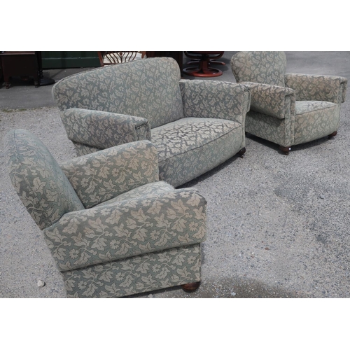 103 - 1930s three piece suite comprising of two seat drop end sofa and a pair of matching armchairs, on bu... 