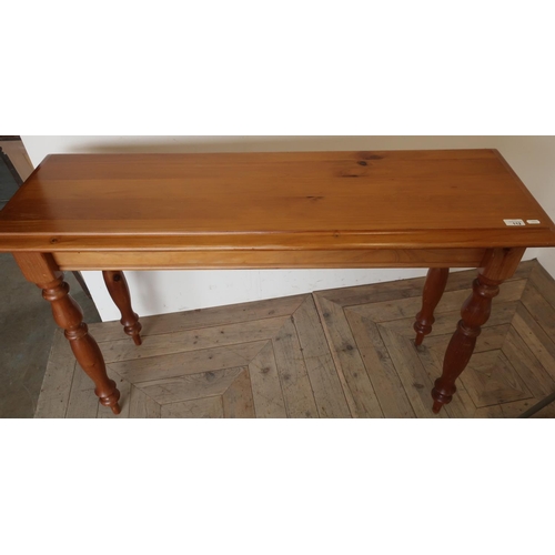 112 - Modern pine rectangular hall table on turned supports  (120cm x 40cm x 77cm)