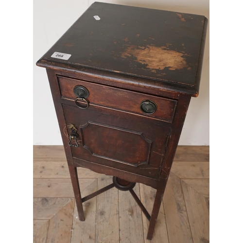 268 - Mahogany pot cupboard with single drawer above paneled door and X shaped understretcher