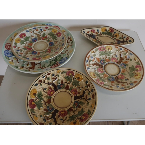 58 - Selection of five various assorted tree and floral pattern chargers and plates
