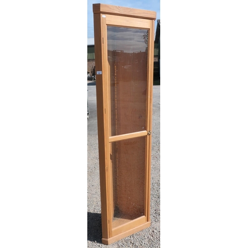 66 - Modern light oak free standing corner unit enclosed by single glazed door (height 194cm)