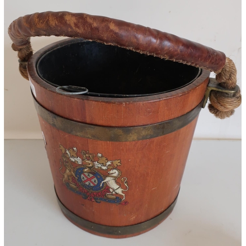 86 - Coopered oak bucket with rope and leather work handle, tin liner and royal coat of arms to the front... 