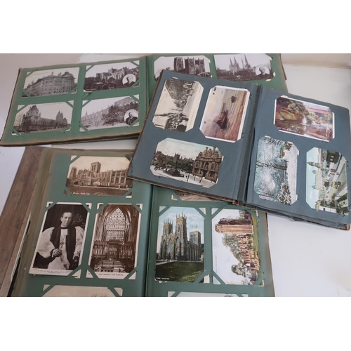 23 - Three albums of postcards containing a large quantity, including some of local interest, Helmsley, M... 