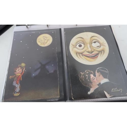 24 - Two albums containing a large quantity of `moonface' type picture postcards