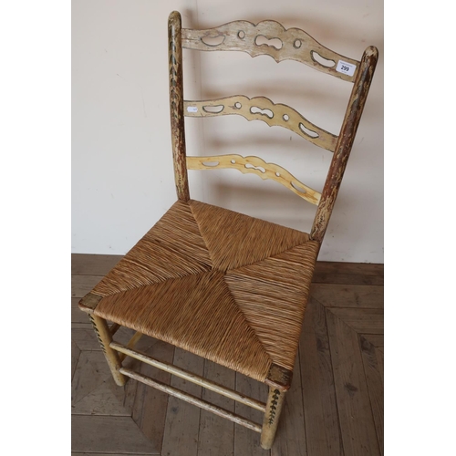 299 - 18th C country rush seated ladder back chair with traces of original paint, similar to a chair by Wi... 