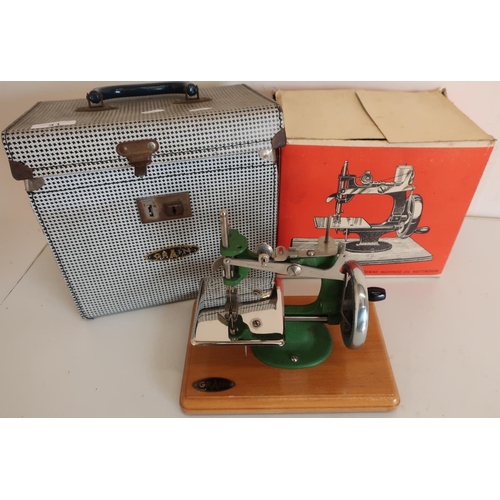 41 - Cased Grain mini hand operated sewing machine with original cardboard box and outer case