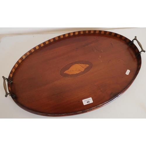 44 - Edwardian mahogany inlaid oval twin handled tray with raised sides and central inlaid shell pattern ... 
