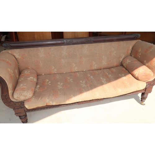 274 - 19th C mahogany framed three seat settee with scroll arms, carved detail and turned and fluted suppo... 