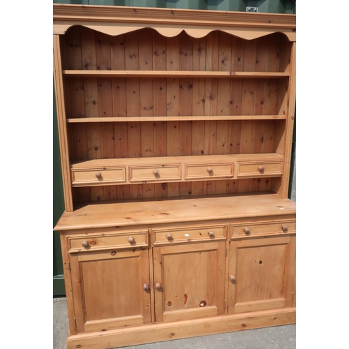 289 - Modern waxed pine dresser with three tier raised back with four drawers above three long drawers and... 